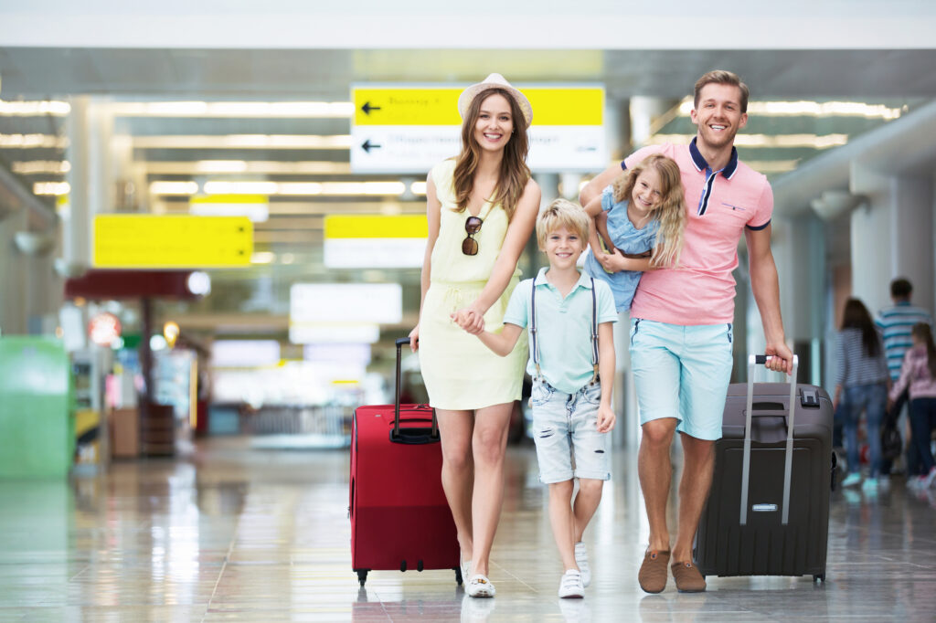 Happy Family with Suitcases
